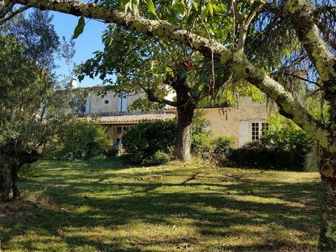 CHARMING STONE HOUSE SURROUNDED BY NATURE AND MATURE GARDEN Only a few kilometers away from Condom and commodities, this property is a gem and benefits from a beautiful environment and lush grounds. The main building and the outbuildings are totally ...