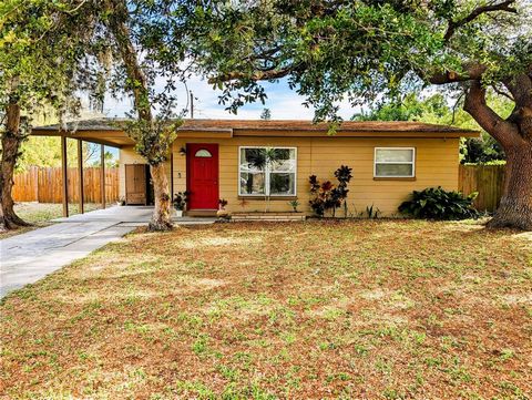 This adorable home is ready for you to move in. The interior features 2 bedrooms and one bath. The dining room leads to a screened in porch that offers afternoon shade. This large backyard features fruits including; mangos, grapes, berries and many o...