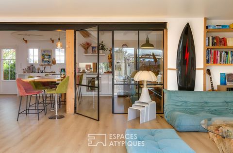 This Capbreton woman from the 20s offers a trendy renovation. Elegantly arranged around decorative design elements, it offers a living volume of 146 m2 on a landscaped and wooded plot of 1000 m2. Inspired by nature and the ocean, raw materials are gi...
