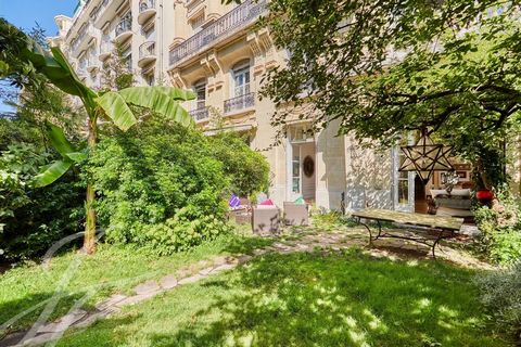 Avenue Maurice Barrès. Exclusively at John Taylor. In a high-standard freestone corner building with a janitor and refined communal areas, we offer you a garden-level apartment with the feel of a home. A very elegant reception apartment, with a surfa...