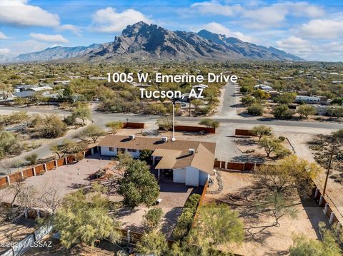 Step into a world of timeless elegance and tranquility at this stunning property in the heart of Tucson's coveted Sunset Manor neighborhood. Situated on a generous 0.82-acre lot, this 3-bedroom, 2-bathroom gem offers 2,912 square feet of beautifully,...