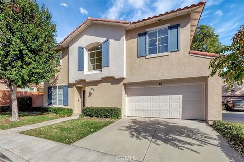 Welcome home to this beautiful detached Melinda Heights Fiesta condominium in desirable Rancho Santa Margarita! Experience privacy with NO COMMON WALLS and your own enclosed patio, perfect for outdoor living. This lovely property boasts luxury vinyl ...