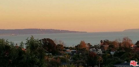 Spectacular sweeping ocean view lot with enormous potential where you'll see all the way to Catalina Island. Located about 1/2 mile from the ocean where many nights, you'll hear the waves. Previous house that burned down in the fire was a 2 story wit...