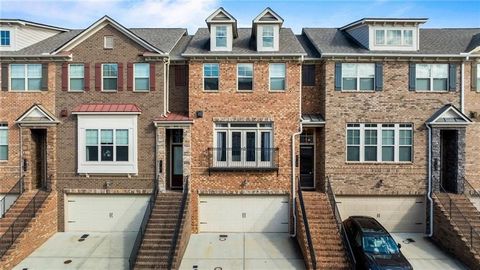 Welcome home to effortless luxury in the heart of Brookhaven! This beautifully maintained townhome is packed with thoughtful updates, including a brand-new HVAC, built-in shelving, and refrigerator—so you can move right in and enjoy worry-free living...