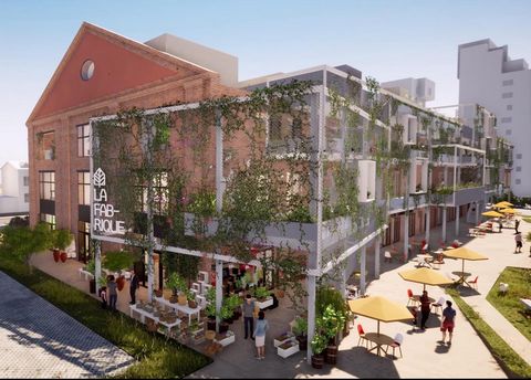 Appartement avec sa terrasse privative dans ancienne halle industrielle réhabilitée.