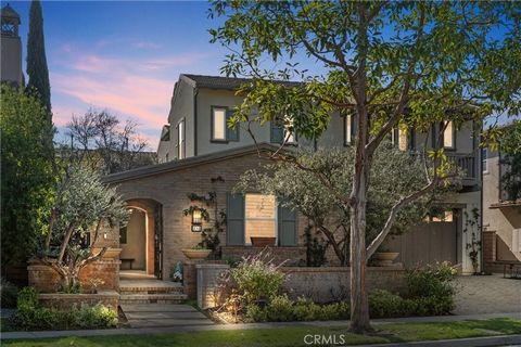 A RARE showpiece residence on a PREMIUM cul-de-sac lot in Irvine's sought-after Quail Hill showcases 3,424 square feet of remarkably designed living space and upgrades like no other. The highly popular 