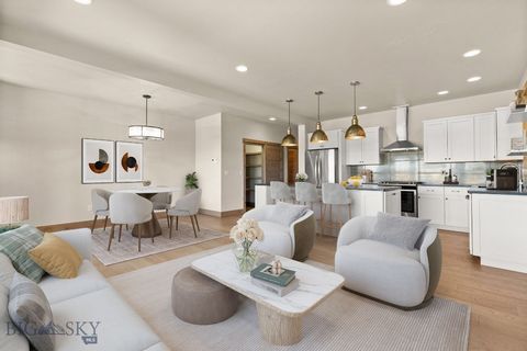 Zeldzame kans in Bozeman's Desirable Southside - Verlaagde VvE-kosten! Dit ruime en stijlvolle herenhuis biedt 2,262 SF aan zorgvuldig ontworpen woonruimte op slechts enkele minuten van de Montana State University, ideaal voor investeerders, universi...