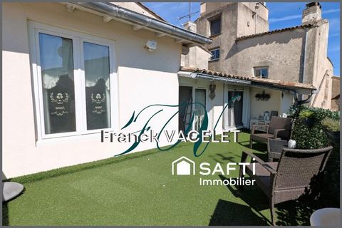 Grande demeure de caractère avec local commercial dans le centre historique