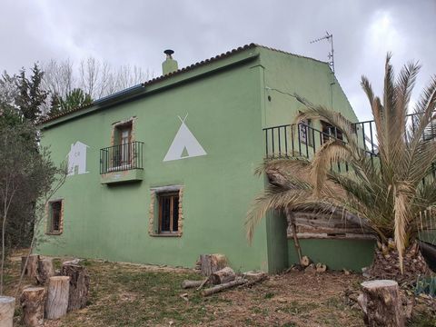 Casa rural with all the licences in place in the country side of Teresa de Cofrentes This very green location is on a short distance of Ayora with a good access road mains water and electrica and agricultural water the casa rural has various family r...