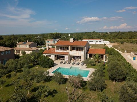 Beautiful villa for sale in Juršići. The villa has an area of 400m2 on a plot of 1990m2 with a swimming pool and 22 olive trees. In the basement there is a tavern (wine store), and on the ground floor there is one bedroom with a bathroom, a living ro...