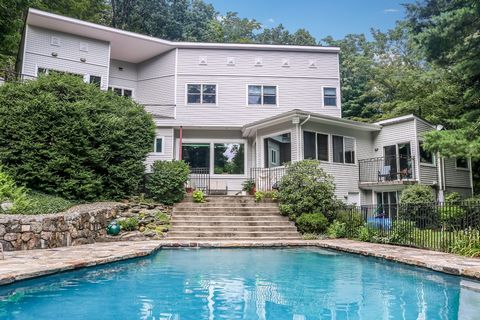 This stunning sun-drenched contemporary home offers the perfect blend of style, comfort and seamless connection to the outdoors. Situated on one of Chappaqua's most sought-after streets, this 4-bed 4-bath home boasts unique design elements and a host...