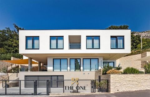 The unique villa is located near the beautiful town of Omiš and is a combination of a perfect location, luxurious style and incredible sea views. The villa is spread over two floors. On the ground floor you will find a spacious open concept with a ki...