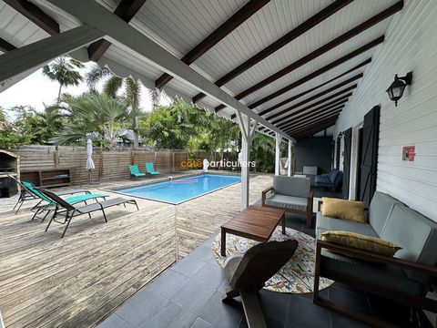 Discover this delightful villa located in the sought-after town of Sainte-Anne in Guadeloupe. This exceptional property offers an idyllic living environment with its three spacious bedrooms, each with their own bathroom, a modern and equipped America...