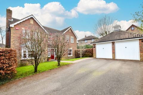 Approached from a tree lined private road, this four bedroomed detached property with a double garage and professionally landscaped south facing garden is presented in showhouse condition and being sold for the first time in 27 years. Conveniently lo...