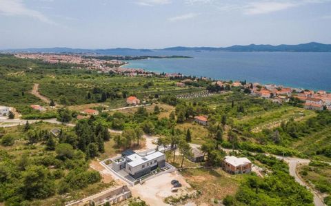 Luxury villa in Diklo, Zadar, with amazing sea views, cca. 500-600 meters from the sea, on elevated position within greenery! Total floorspace is 453 sq.m. Land plot is 1116 sq.m. Construction was completed in 2017-2018. The interior of this stylish ...