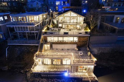 Exquisite Malibu style house that is located right on the Hudson River! 23 Shore is one of only a handful of single family houses that are opposite Manhattan and have a boat dock. The new dock plans would arguably make this the largest one on Shore R...