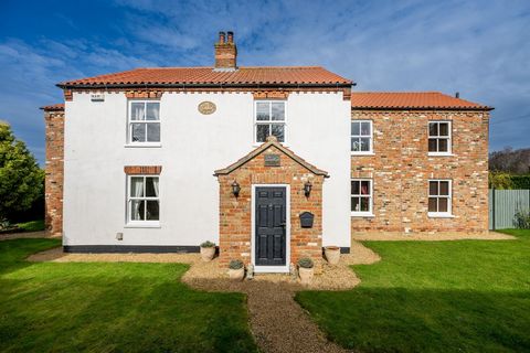 Hallfield House, a magnificent Edwardian gem built in 1909, offers the perfect blend of historic charm and contemporary comfort. This detached beauty, nestled in the quaint Cambridgeshire village of Newton-in-the-Isle, has an abundance of character a...
