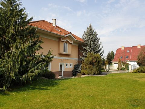 South Budapest near airport and M0 and M5 indoors parking for 3 cars friendly neighbourhood peace and quiet. exclusive 2-storey villa with large garden housing athmospheric fountain. 3 bedroom and a spacious lining room fully equipped with all comfor...