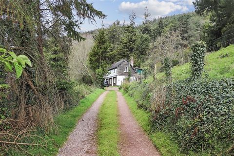 A former stables conversion enjoying a delightful rural setting within The Exmoor National Park with wonderful views and versatile 3 bedroom accommodation all set in surrounding gardens with paddock of just over 1 acre. On the market for the first ti...