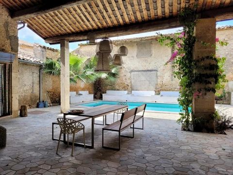 Discover a hidden treasure in a vibrant village, just a 10-minute drive from Beziers. This enchanting property blends a classical winemaker's house with a stunning contemporary barn, creating a visual marvel. The winemaker's house, a self-contained g...