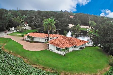 Step into the epitome of equestrian luxury in Southwest Ranches, a coveted gem in South Florida! Nestled within this prestigious and picturesque neighbourhood, you'll discover a one-of-a-kind estate spanning nearly 5 acres of pristine land, seamlessl...