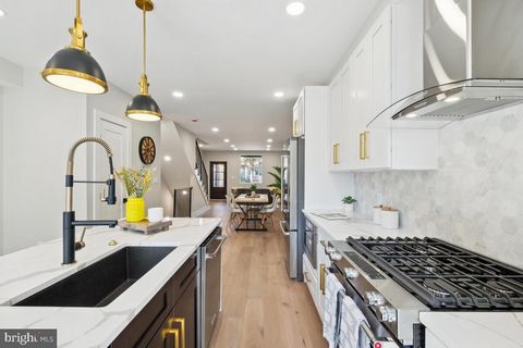 Discover the perfect blend of style, comfort, and convenience in this fully renovated Four-Level townhome located in the heart of the sought-after Petworth neighborhood of Washington, D.C. With four spacious bedrooms and four and a half elegantly des...