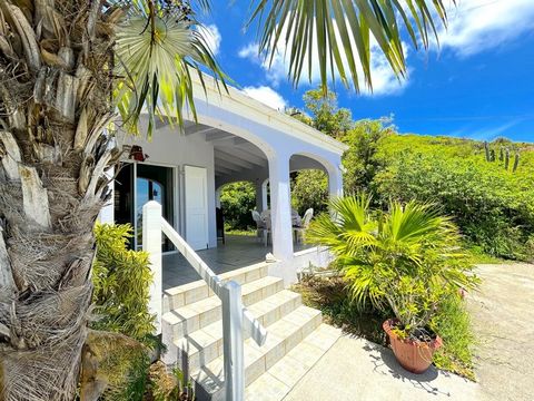 East End home with a VIEW ..The cottage that dreams are made of. Adorable and SOLID! Poured concrete, engineered to the hilt. The gallery is so cozy for enjoying Caribbean Sea views, breezes, passing sailboats and your favorite book or podcast. Quiet...