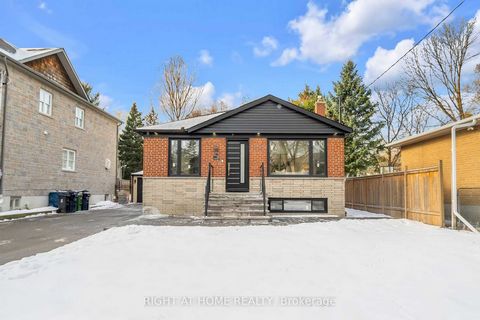 A Unique Opportunity to Own a Luxurious high end top to bottom renovated 3+4 Bed & 4 washroom house. Situated on a 50x201 ft lot with double driveway 12 car parking! This is a one-of-a-kind, unmatched modern property on Scarborough!A highly functiona...