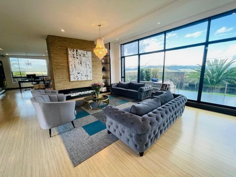 Property-18321 We present this magnificent property in one of the most exclusive residential complexes in the Sabana de Bogotá. A residence that combines luxury, comfort and design in an incomparable natural environment. With a lot area of 2,122 m² a...