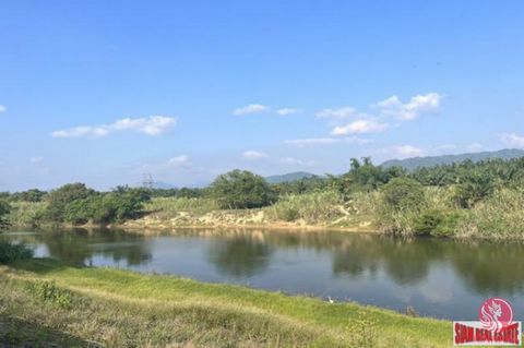 Almost 10 rai land plot for sale along the canal and with mountain views in Takua Pa, Phang Nga. The land is near public roads and there is electricity and water access from the land. Land plot size is 9-3-67 rai (15,868 sqm) and is offered with Chan...