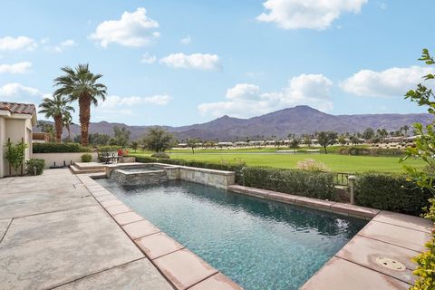 Nestled in the prestigious Trilogy at La Quinta 55+ resort community, this exquisite Tamarisk plan home is a true masterpiece of luxury and design. Boasting breathtaking, panoramic views of the Santa Rosa Mountains, double fairways, shimmering lake, ...