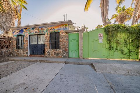 Unlock the potential of this 517 m2 lot with an existing two room one bath structure perfectly positioned on the main thoroughfare in downtown Todos Santos. Located directly across from the public park this is a high trafficked area with excellent ex...