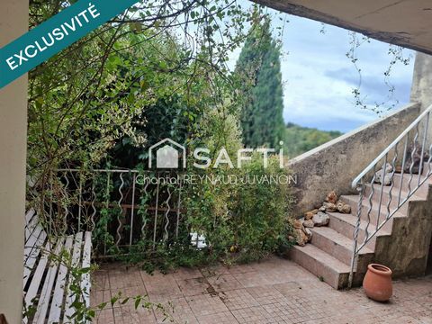 Maison plein centre très lumineuse avec grande baie vitrée sud donnant sur un balcon