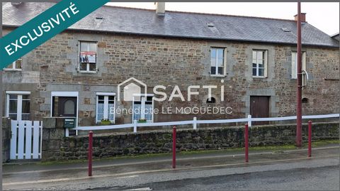 Longère en pierre à rénover, garages et cellier- centre bourg.