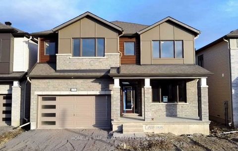 Welcome to this Brand New Detached Home located in the Village of Richmond, be the First One to Enjoy the Premium Ravine Lot. This 5 Bedroom Home has a Hardwood Flooring on the Main and Second Floor with Oak Staircase and Granite Countertops througho...