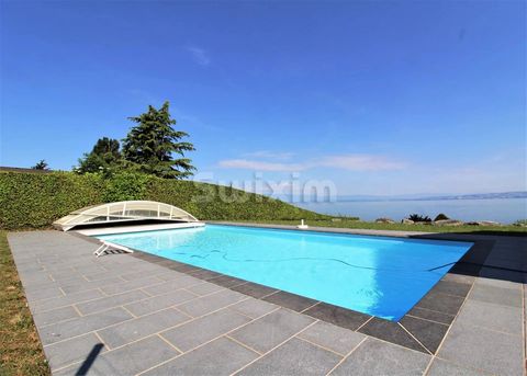 Réf 66300JPA: Lugrin. Villa of approximately 240 M2 on a plot of 1600 M2 on the shores of Lake Geneva. Comprising a living room and veranda opening onto a lake-view terrace, kitchen, 5 bedrooms, one with balcony, 3 bathrooms or shower. Full basement....
