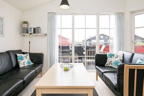 Holiday cottage located in Nr. Lyngvig's old fishing village between the North Sea and Ringkøbing Fjord close to the old lighthouse. There are 3 bedrooms and 2 extra beds on the mezzanine that also has a DVD player. The bathroom has a 2-person whirlp...