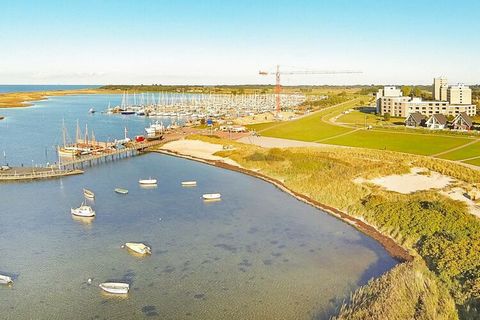 This luxuriously furnished semi-detached, 2-storey, Danish holiday home is located in the well-known marina Marina Wendtorf by Kiel Bay in the 3rd row, beautifully surrounded by beautiful sandy beaches and a nature area. The house is modernly decorat...
