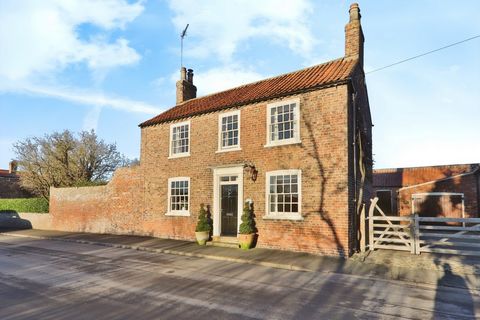 INVITING OFFERS BETWEEN £650,000-£670,000 Check out the video!! A BEAUTIFULLY PRESENTED GEORGIAN PERIOD PROPERTY IN ONE OF THE MOST DESIRABLE VILLAGES JUST OVER FIVE MILES FROM BEVERLEY Standing on a substantial ¼ acre plot this Grade II Listed Georg...