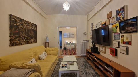 Property code:15-1289 - In the center of Pagrati FOR SALE apartment on the 2nd floor with a total area of 76 sq.m. It consists of 1 bedroom, 2 living rooms, kitchen, bathroom. It was built in 1972 and has central heating - gas, wooden frames, awnings...
