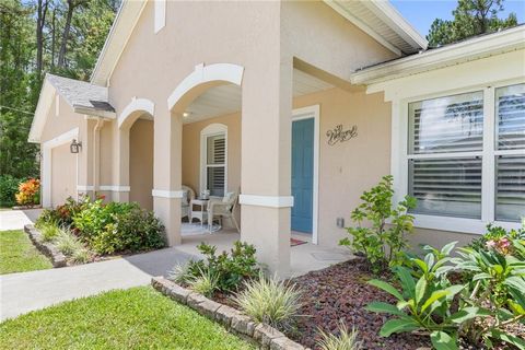 Price Improvement!! Come take a look and discover this hidden jewel of a home on a quiet and private cul-de-sac street where you can enjoy a serene life yet be close to all of Palm Coast's amenities! Welcome home to Birch Haven Place. Oversized Circu...
