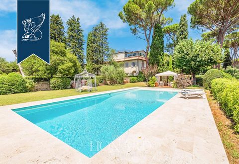 On the charming hills of Florence, there is this refined noble estate for sale. This two-family villa, measuring 630 sqm overall, is characterized by an enchanting loggia supported by columns and arches, an internal courtyard and a wonderful 2,800-sq...