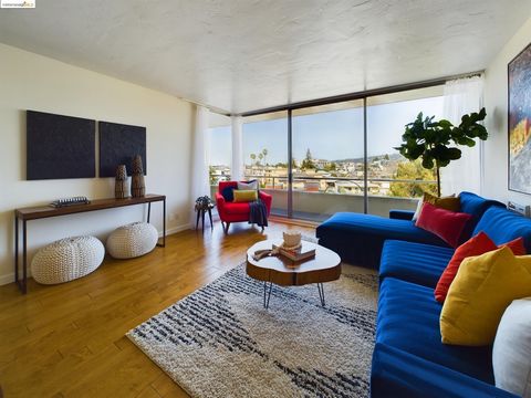 Located in the coveted, mid-century, Van Buren Tower in the sought-after Adams Point neighborhood of Oakland, this fabulous condo is a rare gem. High above Lake Merritt on the 8th floor, this updated unit enjoys serene views of the Oakland/Berkeley H...