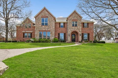 Explore the charm of this Texas-sized home, boasting 5 BRs, 7 baths, and situated on 1.02-acre lot in the heart of Flower Mound. Enjoy the community, where local children walk to the local School, and neighbors are seen jogging, biking or riding at t...