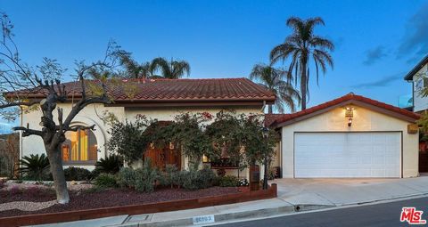 Nestled within the coveted Glencrest Hills neighborhood, this 4BD/4BA Spanish-style residence with an additional guest suite sits serenely at the end of a tranquil cul-de-sac, occupying nearly half an acre of lush land. Revel in breathtaking vistas o...