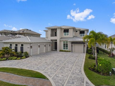 Welcome to your custom-built waterfront oasis in Bradenton, where luxury, convenience, and leisure converge seamlessly. This two-story, five-bedroom, 6 1/2-bathroom estate spans over 5500 square feet of meticulously designed living space, offering an...