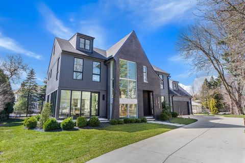 A Modernist Dream is Realized in East Winnetka! This unexpected luxe modern masterpiece represents a brilliant fusion of space, light, design, and the breathtaking beauty of Lake Michigan. The custom-built home, completed in 2023, unites six bedrooms...