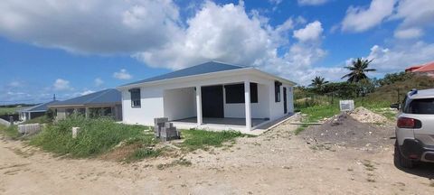 This new construction combines the charm of the Creole house with the high ceilings of its exposed framework and modernity with its colours, its high quality materials meeting the latest construction and insulation standards and its contemporary styl...