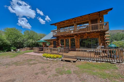 Hansel & Gretel would be proud! +/-20 acres, including approximately 1/4 mile on both sides of Cochetopa Creek, with the cutest 2 bedroom, 2 bath custom log cabin, located on thepristine Highway 114 just +/-20 miles south of Gunnison, CO. If you've n...