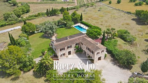 This imposing finca in traditional Mallorcan style is located just a few minutes from the picturesque villages of Pollensa and Alcudia. The 411m2 country house was built on a 16,423m2 plot and has 5 double bedrooms, 3 bathrooms (two en suite) and a g...